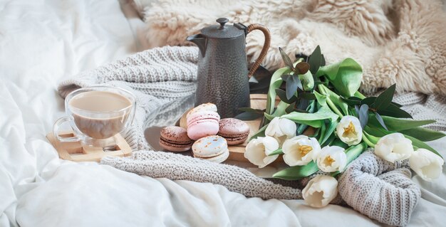 Still-life morning breakfast with coffee and macaroon