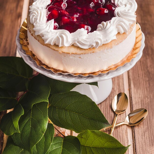 still life of mousse cake and leaves 