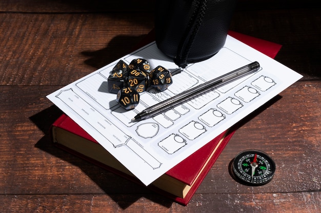Still life of objects with role playing game sheet