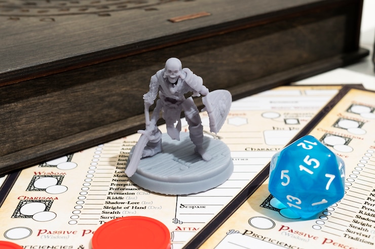 Free Photo still life of objects with role playing game sheet