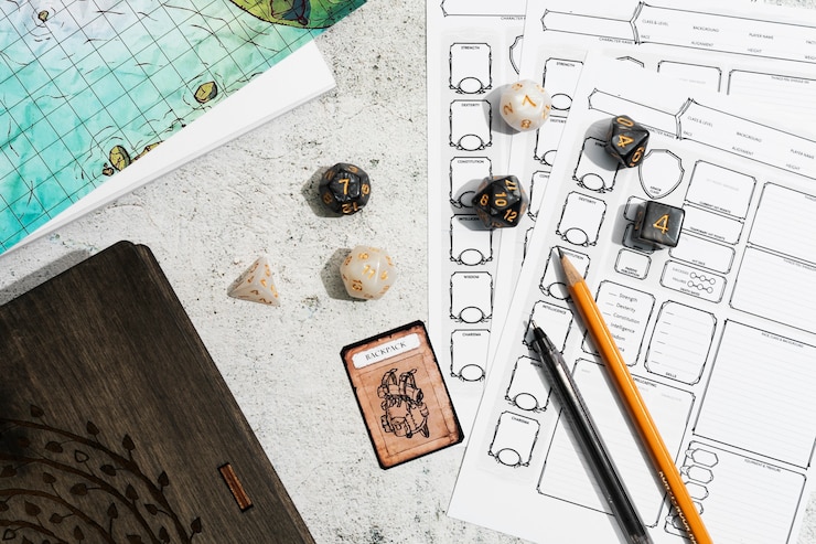 Free Photo still life of objects with role playing game sheet