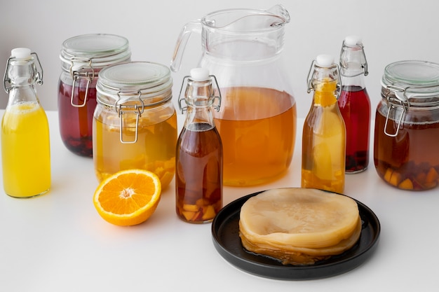 무료 사진 kombucha 병의 정물화