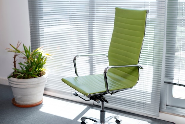 Free photo still life of office chair indoors