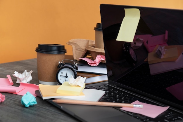 Free photo still life of office desk  mess