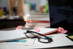 Free photo still life of office desk  mess