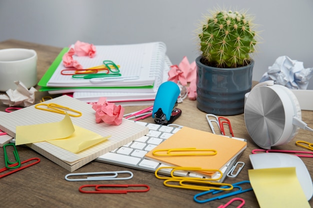 Free photo still life of office desk  mess