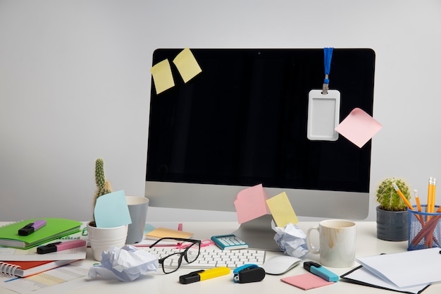 Free photo still life of office desk  mess