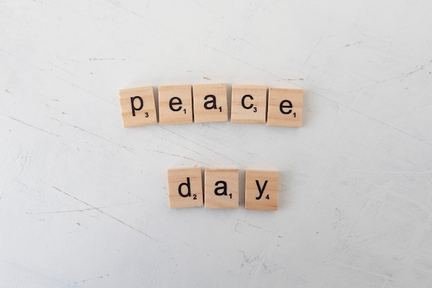 Still life peace day wooden message arrangement