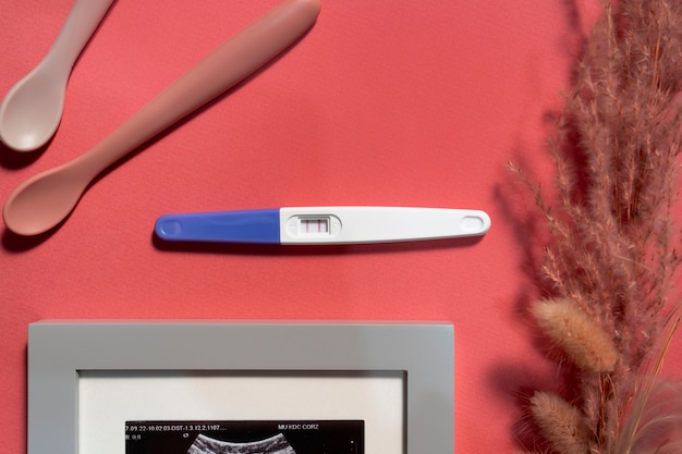 Free photo still life of positive pregnancy test