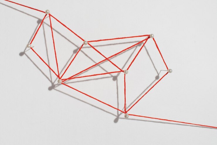 Free Photo still life of red thread connection