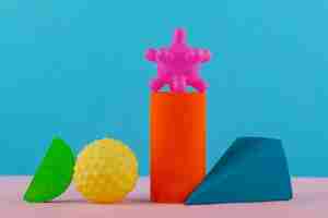 Free photo still life of small decorative objects with vivid colors