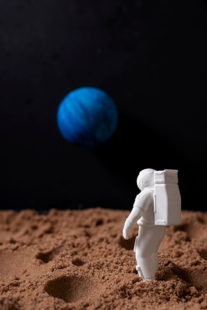 Free photo still life space arrangement with astronaut