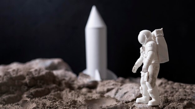 still life space arrangement with astronaut