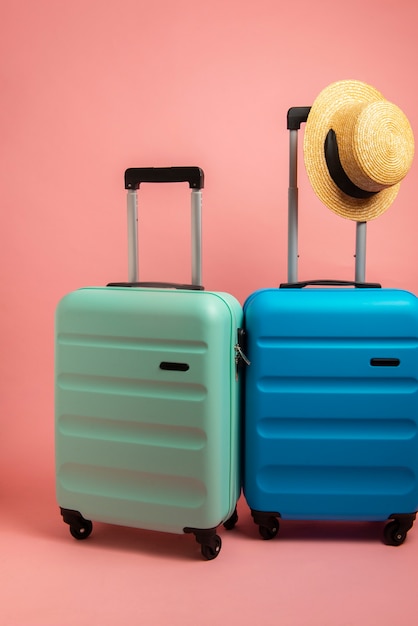 Free photo still life of suitcases with wheels