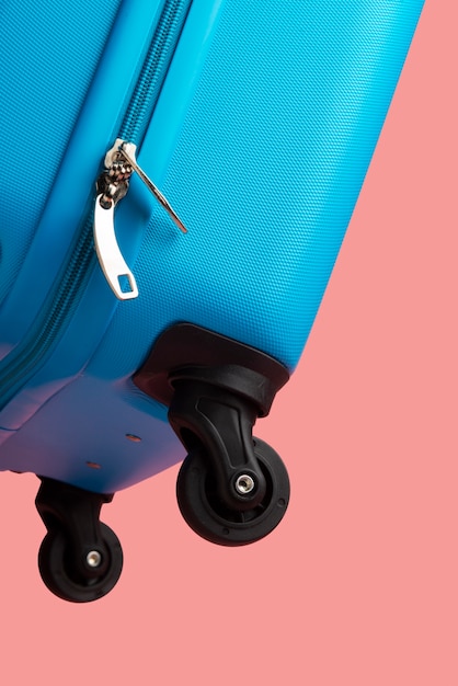 Free photo still life of suitcases with wheels