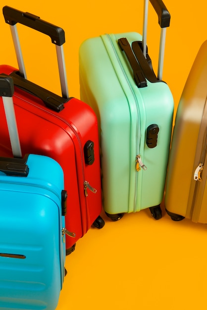 Free photo still life of suitcases with wheels