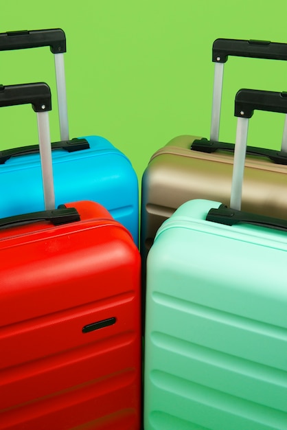 Free photo still life of suitcases with wheels