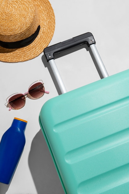 Free photo still life of suitcases with wheels