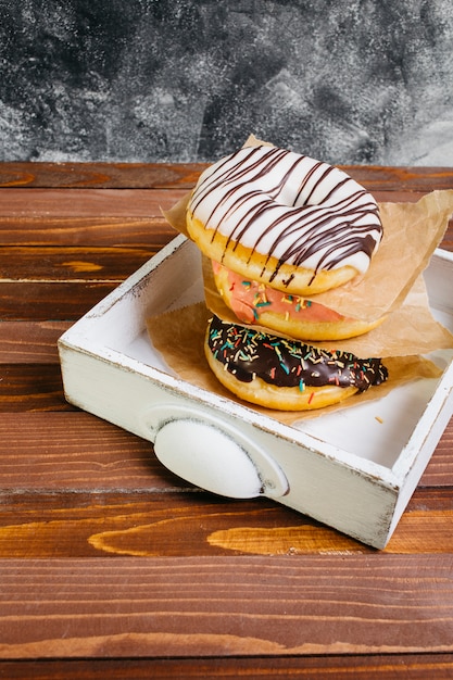 Free photo still life of tasty donuts