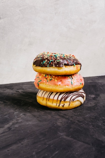 Free photo still life of tasty donuts