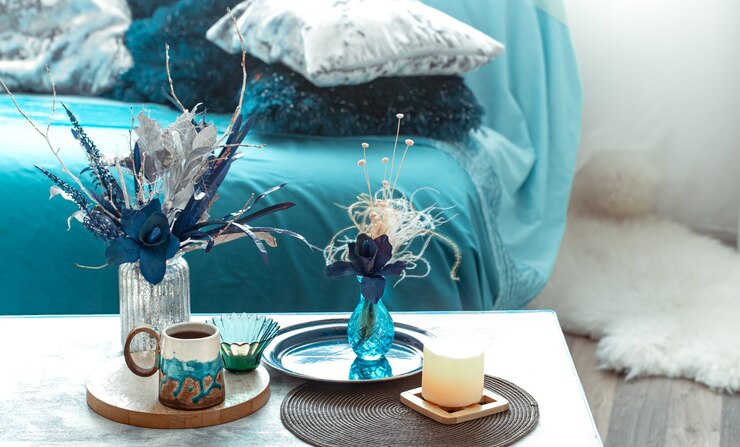 Free Photo still life vase with artificial flowers in the living room.