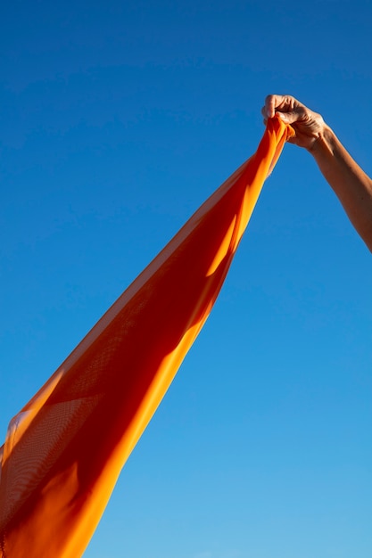 Free photo still life of waving fabric in the air