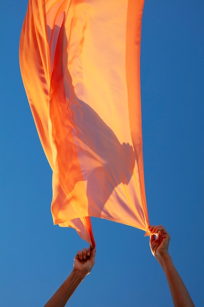 Free photo still life of waving fabric in the air