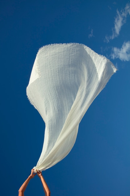 Free photo still life of waving fabric in the air