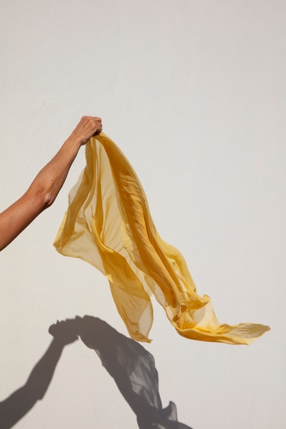 Free photo still life of waving fabric in the air