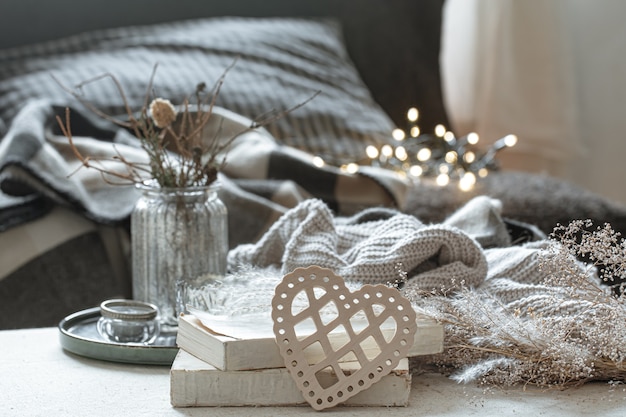 Still life with decorative hearts and books