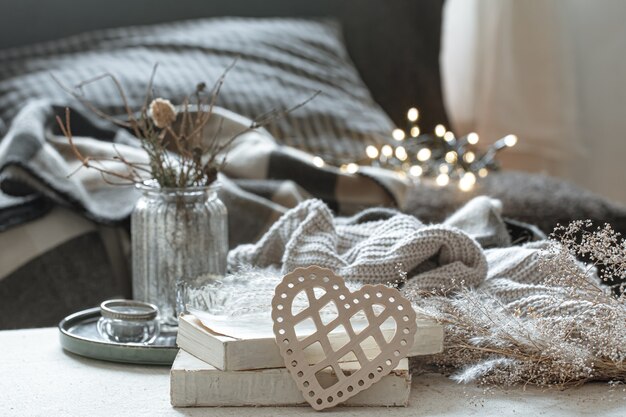 Still life with decorative hearts and books