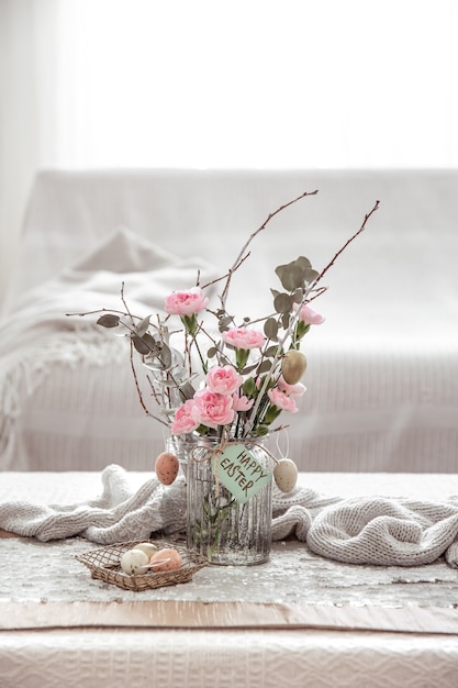 Still Life With Fresh Flowers In A Vase And Details Of Festive Easter Decor