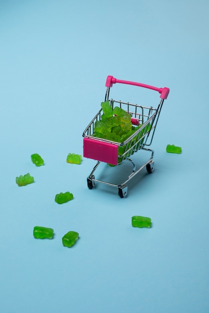 Free photo still life with green gummy bears