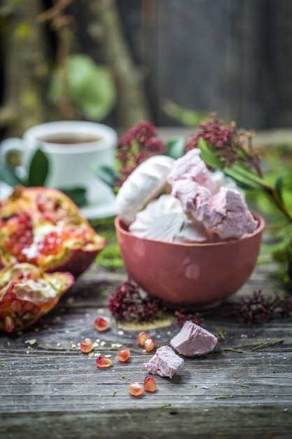 still life with marshmallows and pomegranate