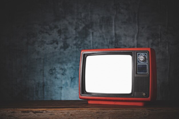 Still life with Retro old red TV.