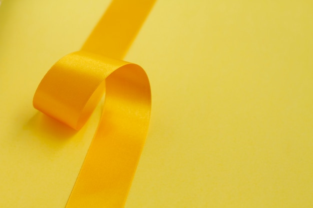 Still life of yellow ribbon