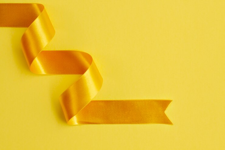 Free Photo still life of yellow ribbon