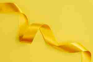 Free photo still life of yellow ribbon