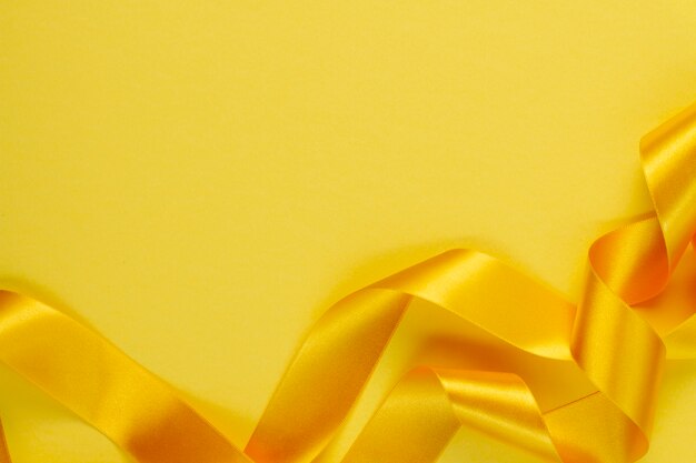 Free photo still life of yellow ribbon