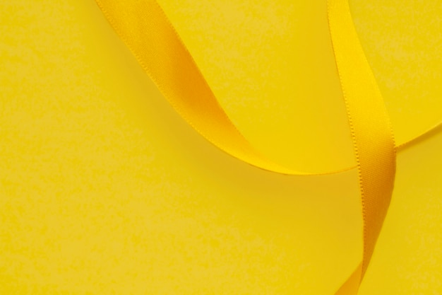 Free photo still life of yellow ribbon