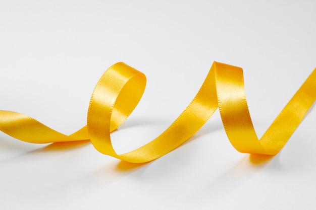 Free photo still life of yellow ribbon