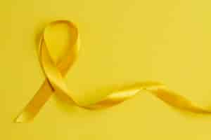 Free photo still life of yellow ribbon