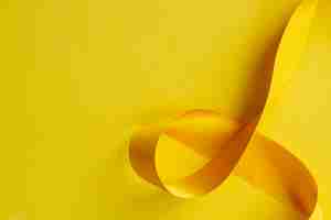 Free photo still life of yellow ribbon