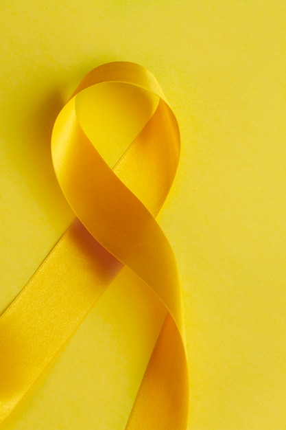 Free photo still life of yellow ribbon