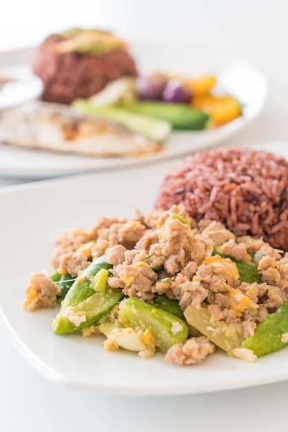 stir-fried cucumber, egg and mince with berry rice