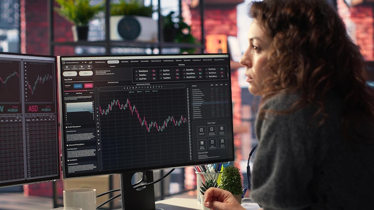 Free Photo stock market investor monitors digital charts and candlestick patterns
