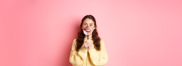 Stomagology and healthcare concept young beautiful girl with perfect smile showing her white teeth w