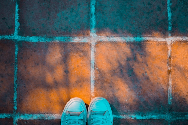 Free photo stone floor with shoes