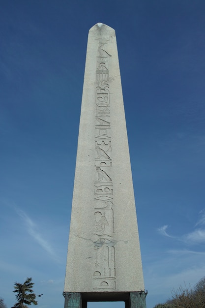 Stone monolith with sky background