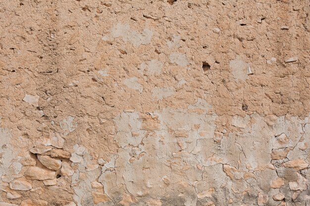 ベージュ色の石の壁